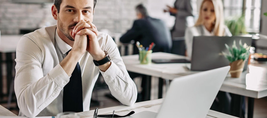 Young Pensive Businessman Working Desk Office Thinking Something There Are People Background 637285 18