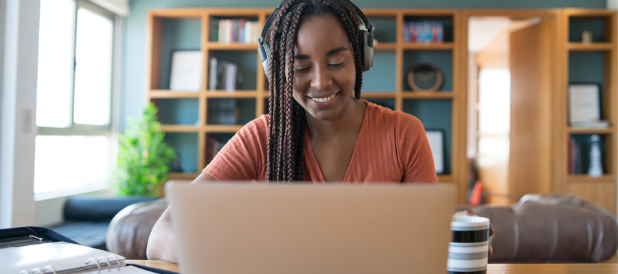 Portrait Woman Video Call With Laptop Headphones While Working From Home Concept